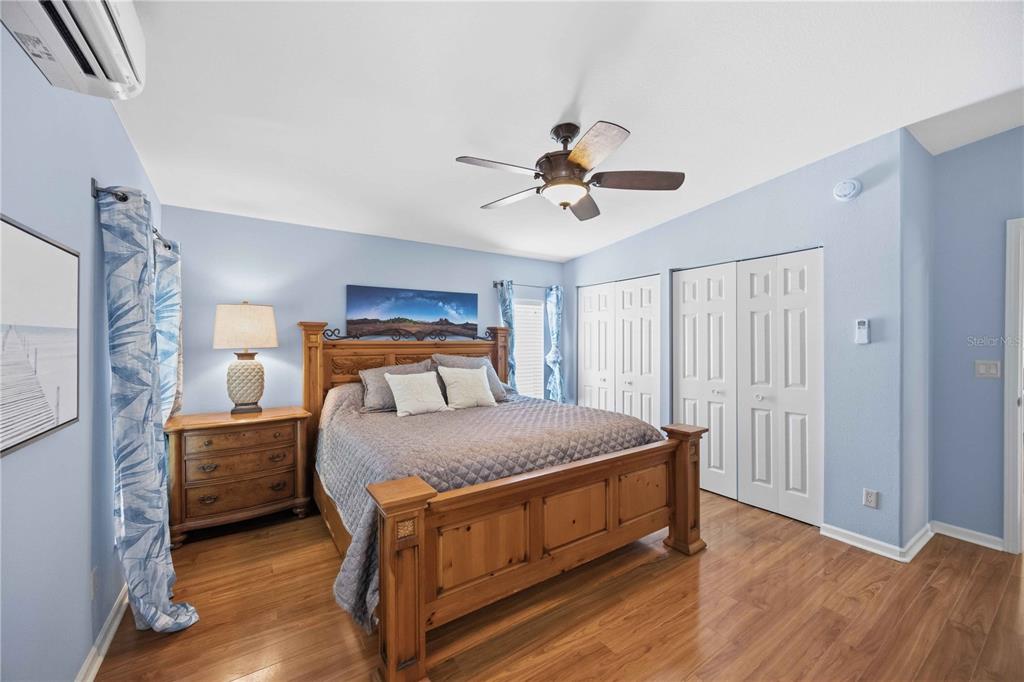 18 Emden Circle Punta Gorda, FL 33950 - Photo 28 of 61 a bedroom with a bed and a chandelier
