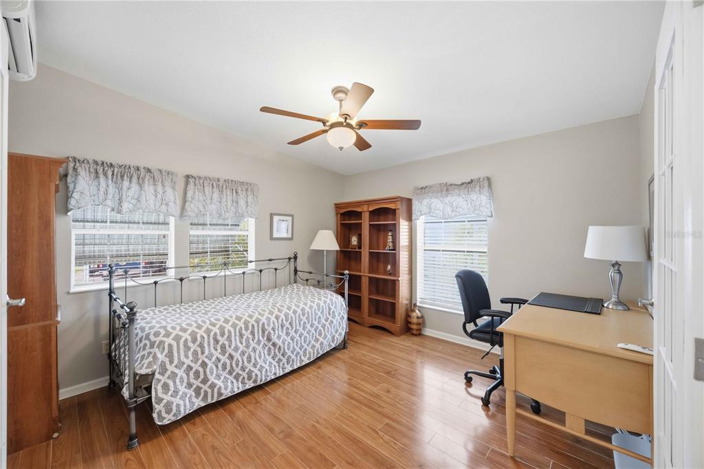 18 Emden Circle Punta Gorda, FL 33950 - Photo 34 of 61 a bedroom with a bed and wooden floor
