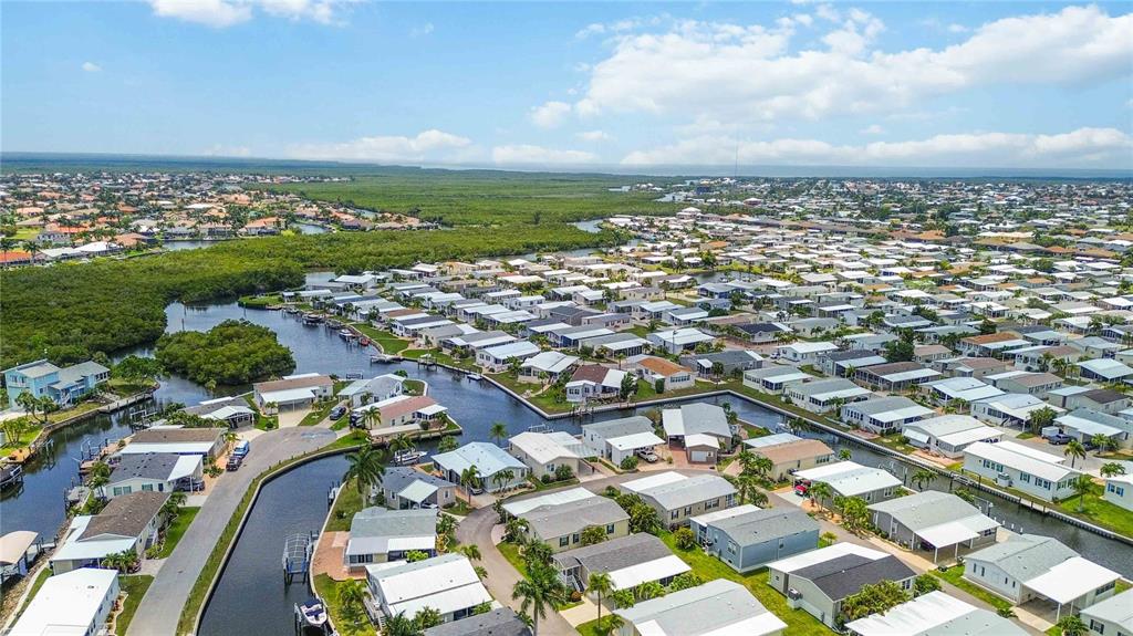 18 Emden Circle Punta Gorda, FL 33950 - Photo 57 of 61 an aerial view of residential building and lake