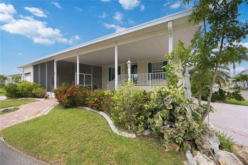 18 Emden Circle Punta Gorda, FL 33950 - Photo 6 of 61 a front view of a house with garden
