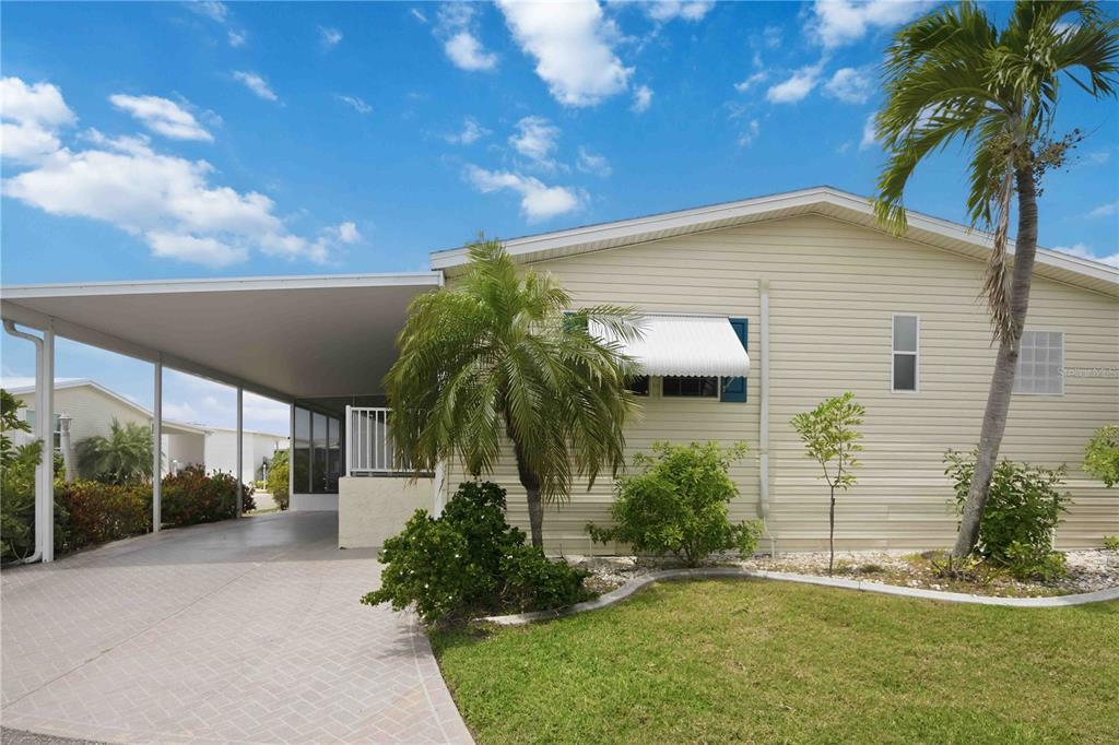 18 Emden Circle Punta Gorda, FL 33950 - Photo 7 of 61 a house with a tree in front of it