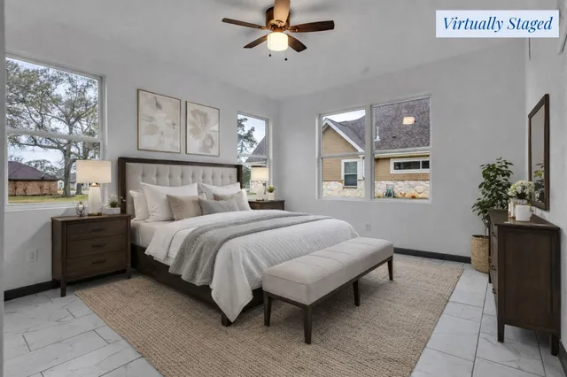 a view of a house with yard and porch