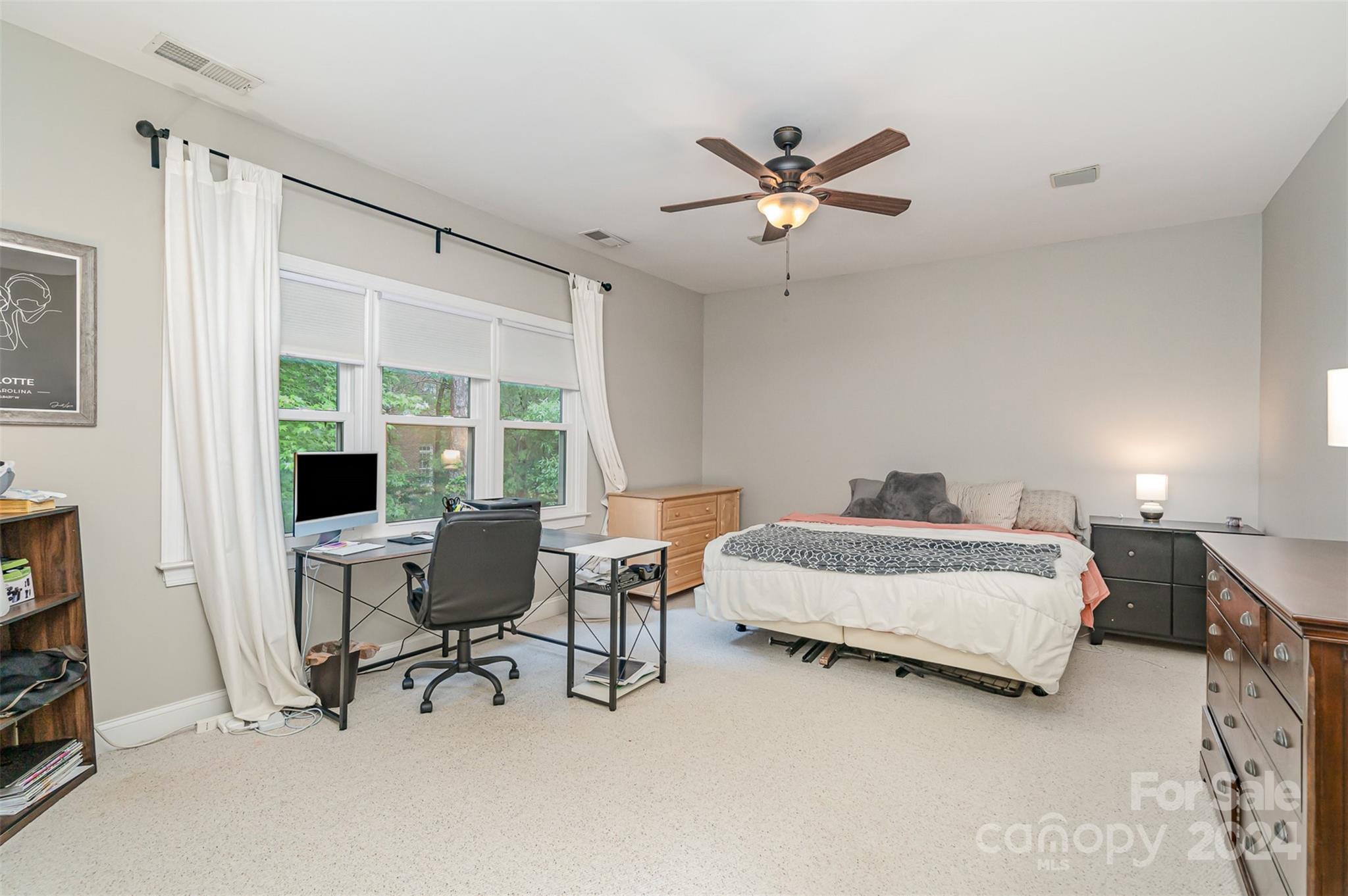 3410 Rhett Butler Place Charlotte, NC 28270 - Photo 23 of 31 a spacious bedroom with a bed and a window
