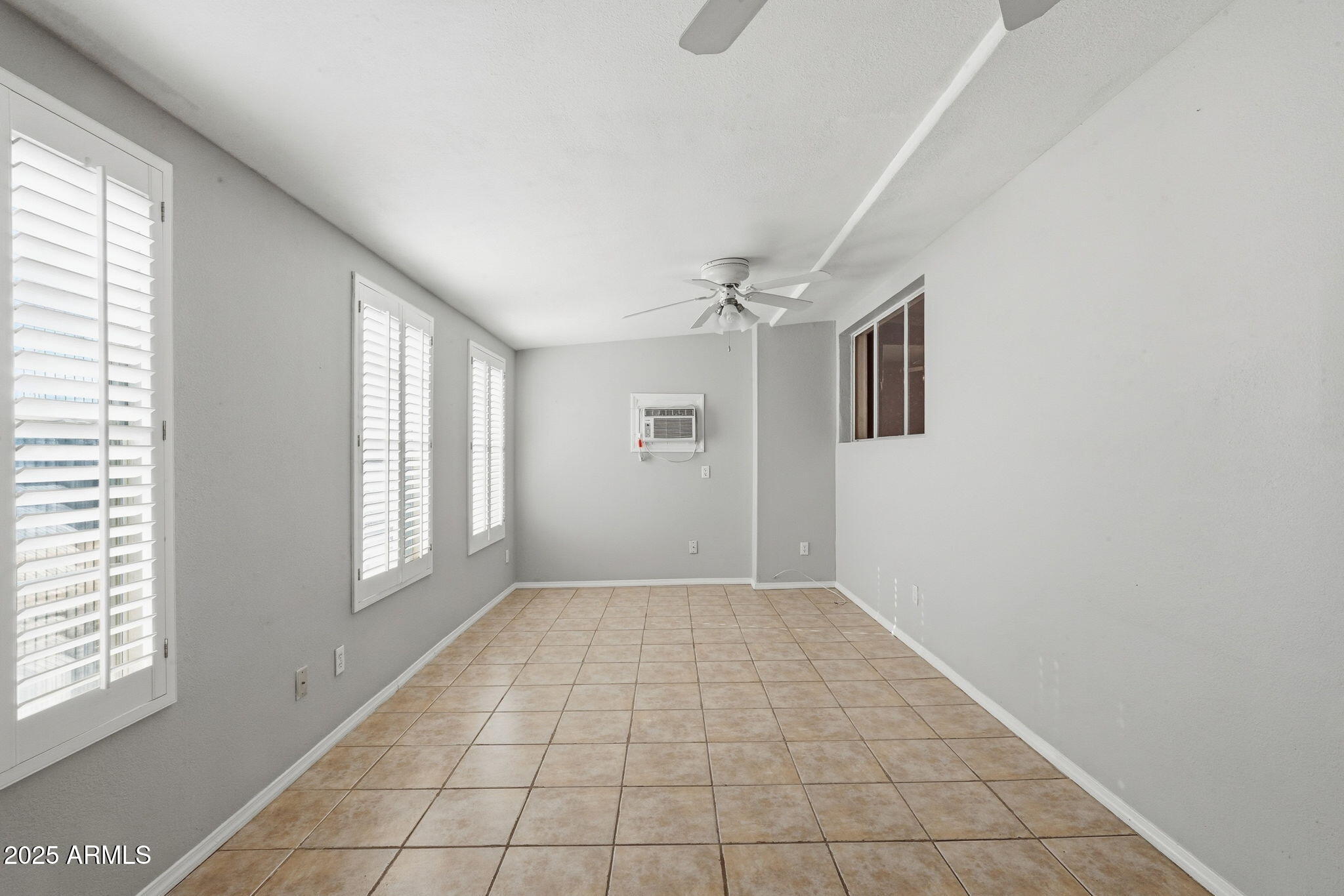 1208 North Palm Ln Circle Coolidge, AZ 85128 - Photo 12 of 33 a view of an empty room with a window
