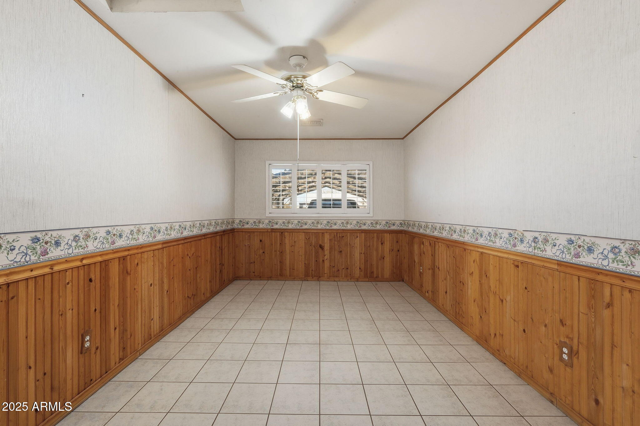 1208 North Palm Ln Circle Coolidge, AZ 85128 - Photo 19 of 33 a view of an empty room with a window