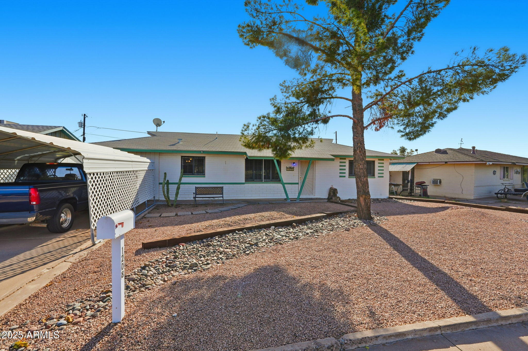 1208 North Palm Ln Circle Coolidge, AZ 85128 - Photo 2 of 33 a view of a house with a patio