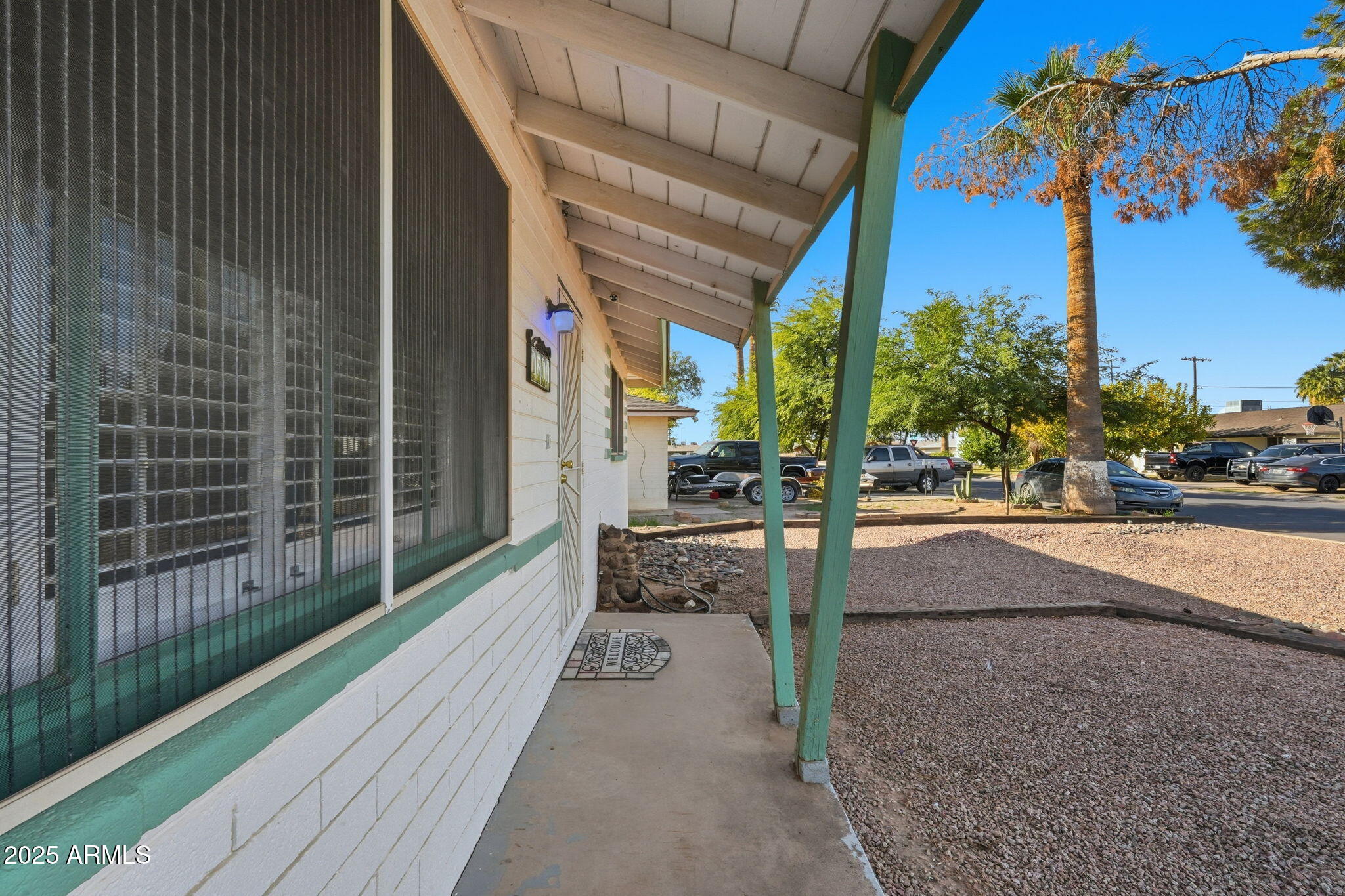 1208 North Palm Ln Circle Coolidge, AZ 85128 - Photo 4 of 33 a view of a pathway with a patio