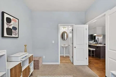 a utility room with cabinets dryer and washer