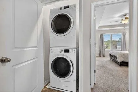 a view of a hallway with washer and dryer