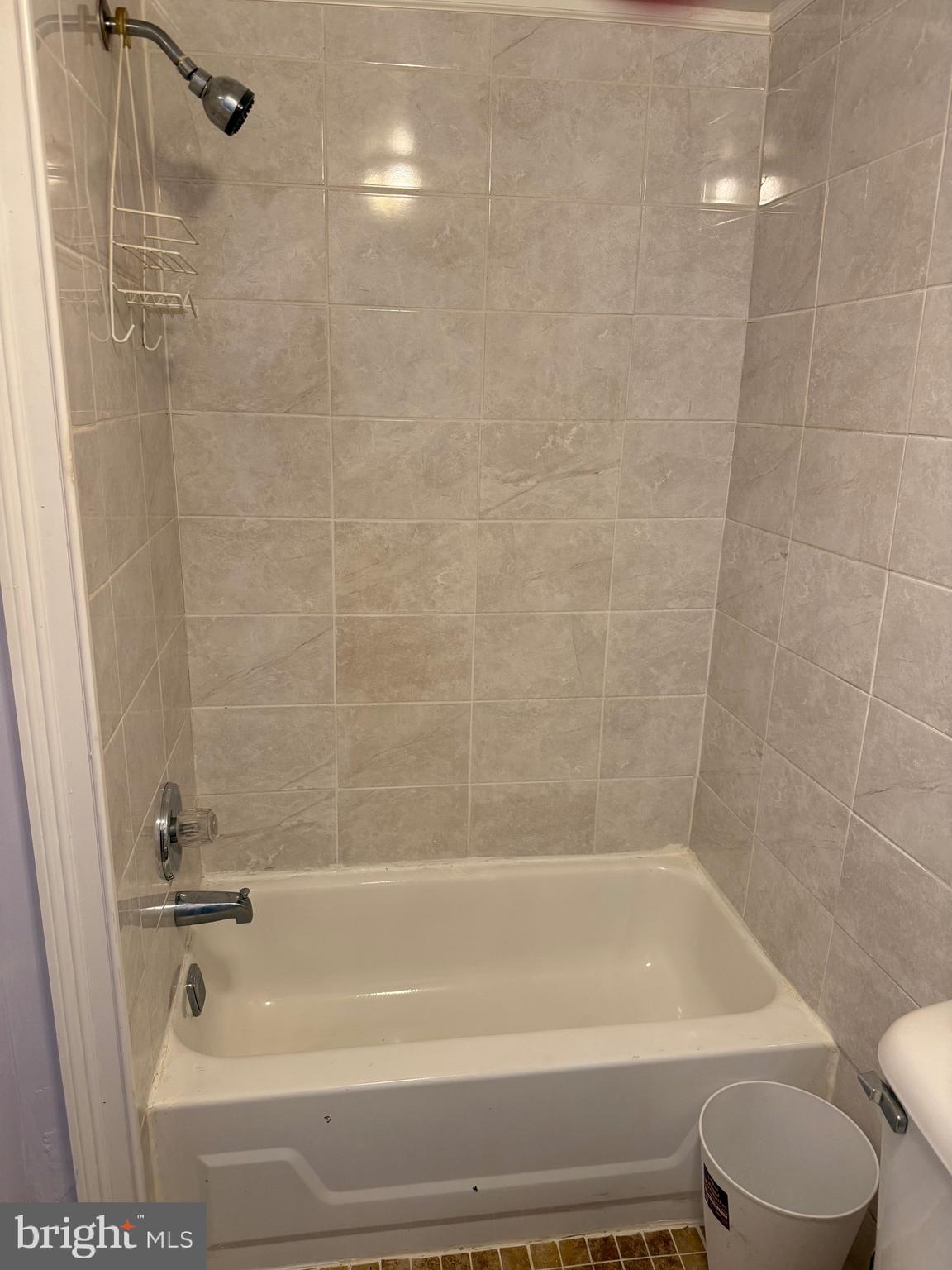 1041 Fanshawe Street Philadelphia, PA 19111 - Photo 6 of 6 a bathroom with a bathtub and a shower