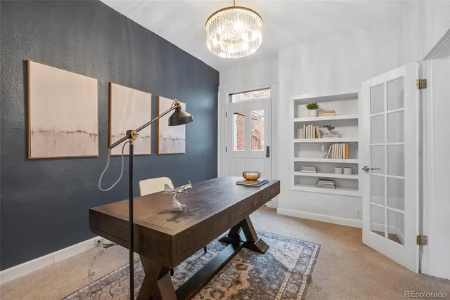 a view of a workspace with furniture