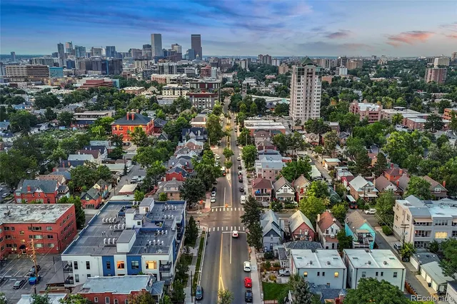 a view of a street with cars