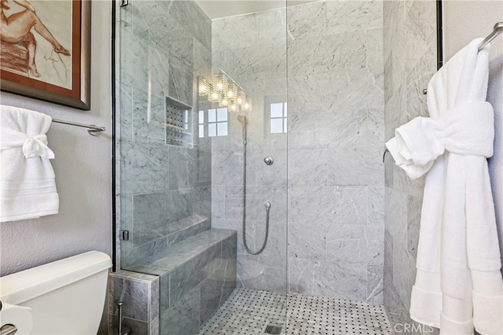 13541 Dean Street Tustin, CA 92780 - Photo 12 of 30 a bathroom with a shower and toilet