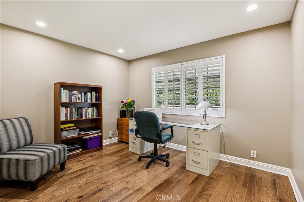 13541 Dean Street Tustin, CA 92780 - Photo 15 of 30 a view of a livingroom with workspace and a couch