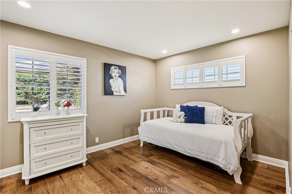 13541 Dean Street Tustin, CA 92780 - Photo 16 of 30 a bedroom with a bed and a window