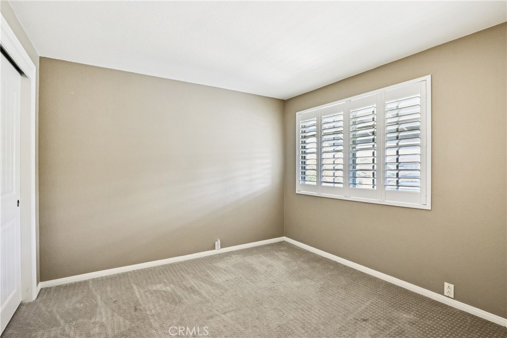 13541 Dean Street Tustin, CA 92780 - Photo 20 of 30 an empty room with a window
