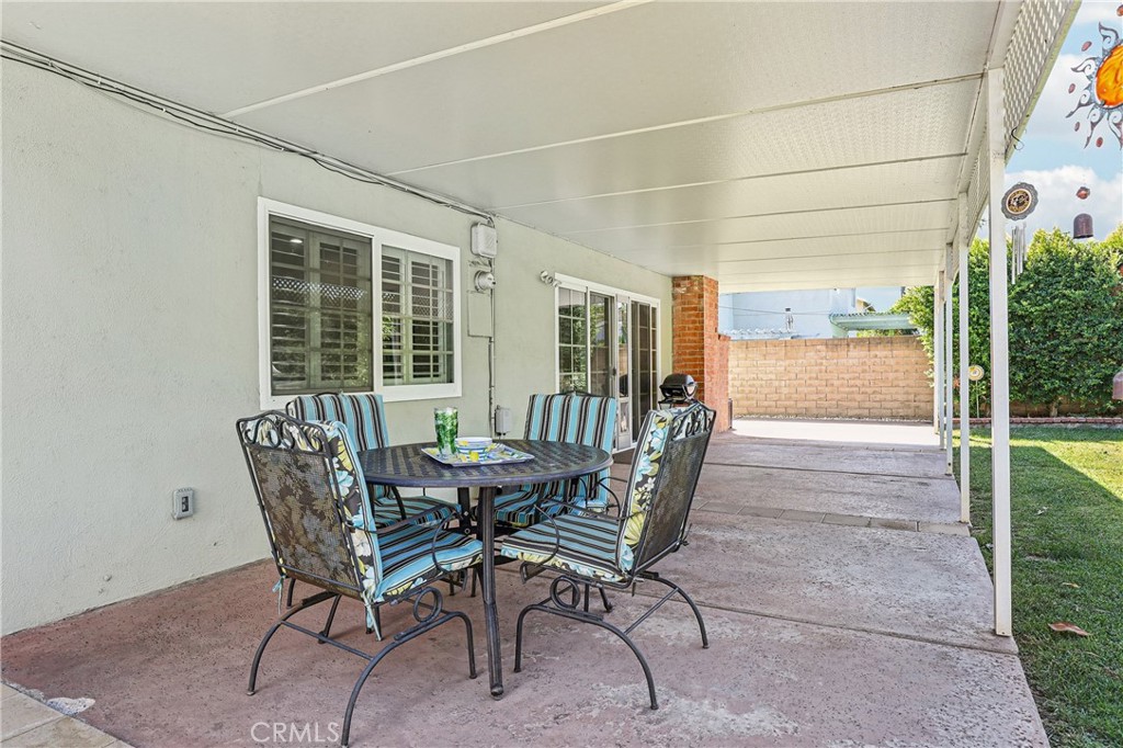 13541 Dean Street Tustin, CA 92780 - Photo 24 of 30 a view of a dining room with furniture and window