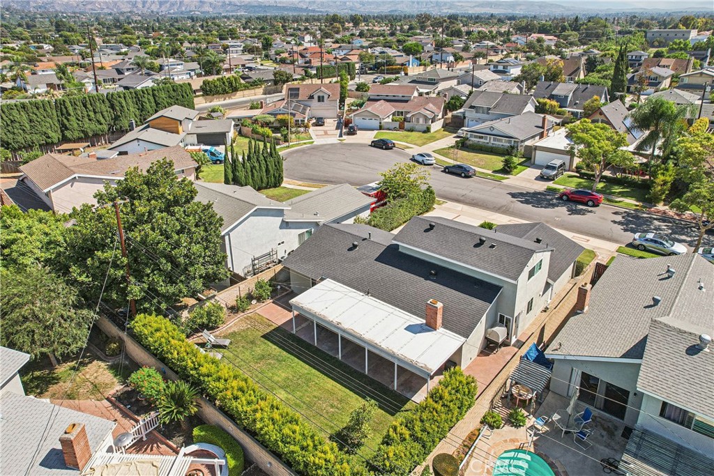 13541 Dean Street Tustin, CA 92780 - Photo 27 of 30 an aerial view of residential houses with yard