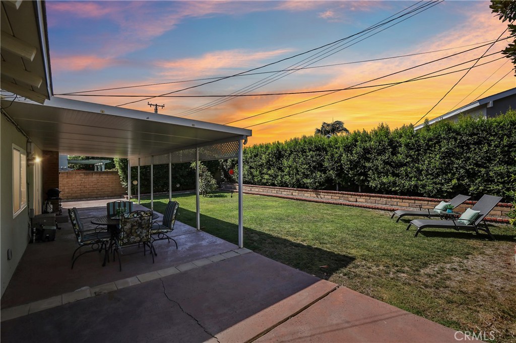 13541 Dean Street Tustin, CA 92780 - Photo 29 of 30 a view of outdoor space yard deck patio and swimming pool