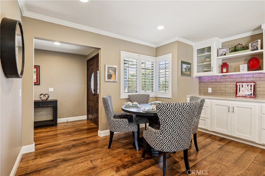 13541 Dean Street Tustin, CA 92780 - Photo 3 of 30 a view of a dining room with furniture window and wooden floor