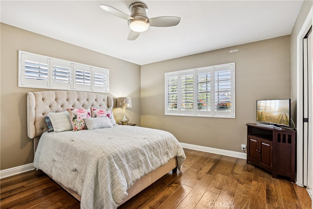 13541 Dean Street Tustin, CA 92780 - Photo 10 of 30 a bedroom with a bed and a tv