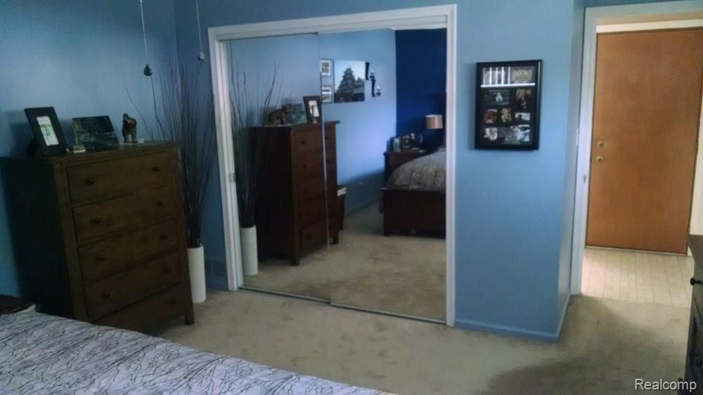 15714 Champaign Road Allen Park, MI 48101 - Photo 19 of 24 MASTER BEDROOM VIEW. REAR EXIT DOOR IN RIGHT BACKGROUND.