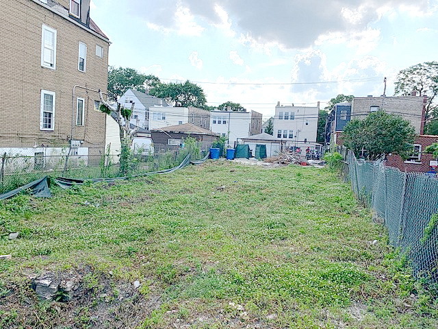 2054 North Pulaski Road Chicago, IL 60639 - Photo 2 of 2 a view of a city with tall buildings and a big yard
