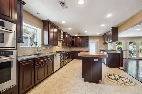 $599,000 | 7726 Meadowvale Drive, Houston, TX 77063