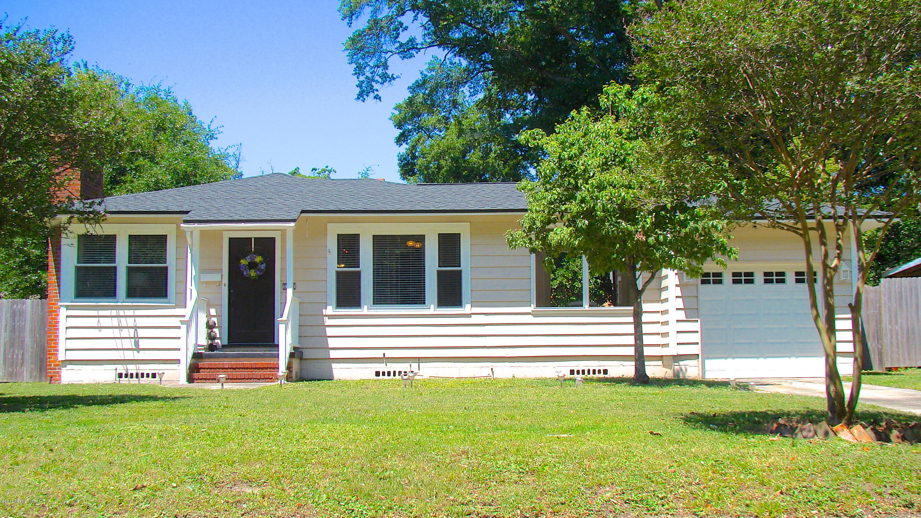 5504 Stetson Road Jacksonville, FL 32207 - Photo 1 of 15 a view of a house with a yard