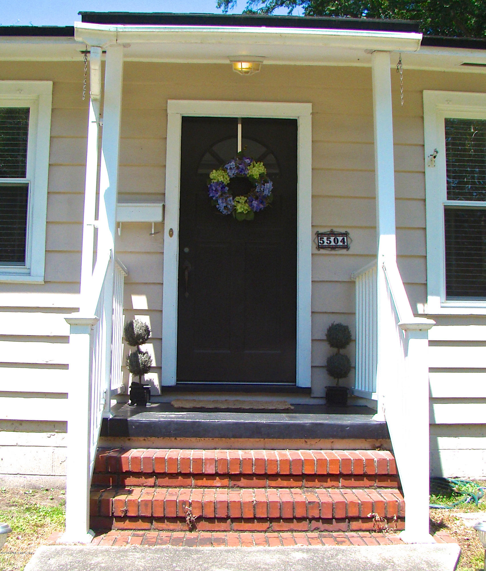 5504 Stetson Road Jacksonville, FL 32207 - Photo 3 of 15 a view of a entryway door of the house