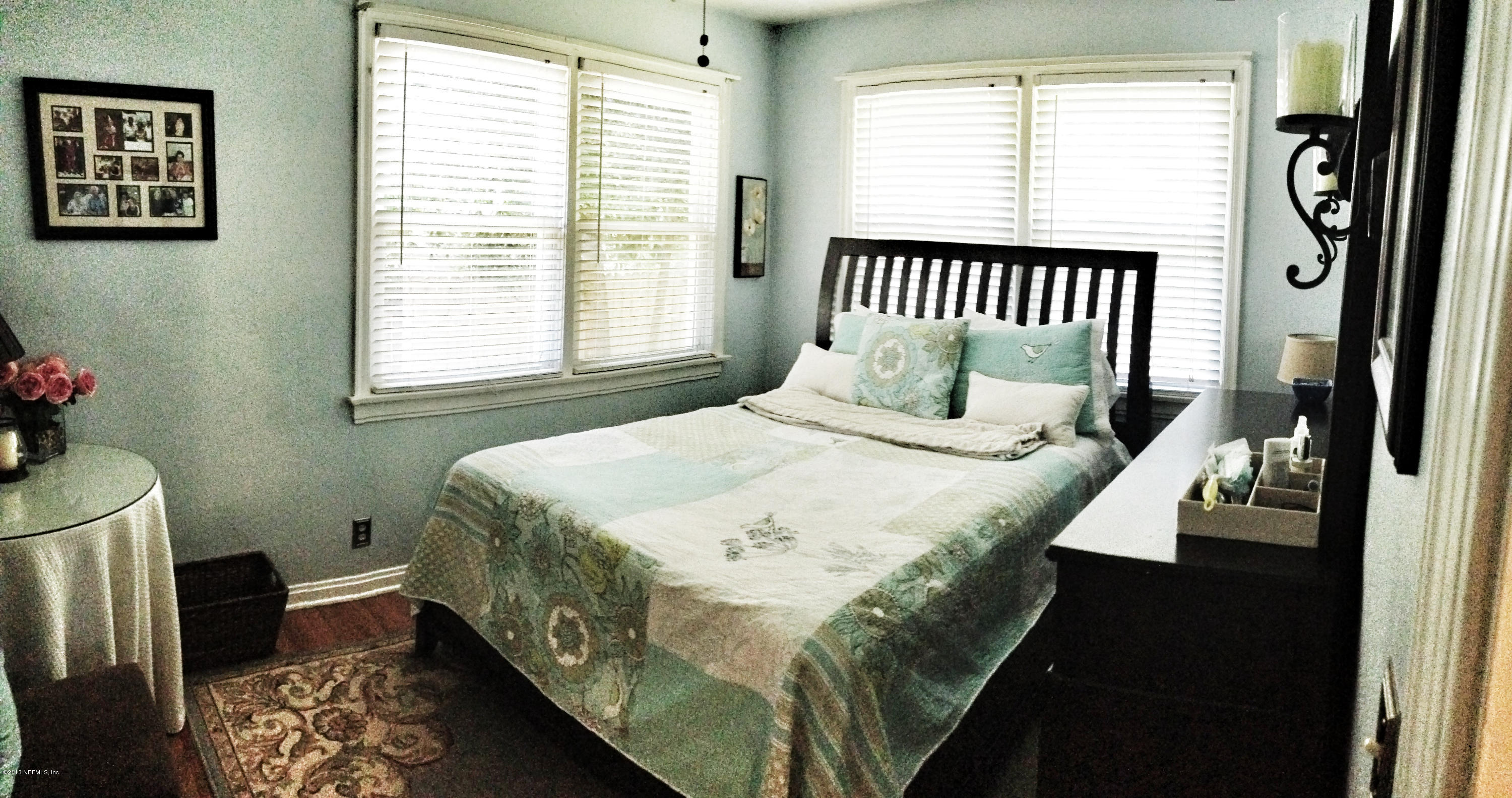 5504 Stetson Road Jacksonville, FL 32207 - Photo 8 of 15 a bedroom with a bed and a window in it