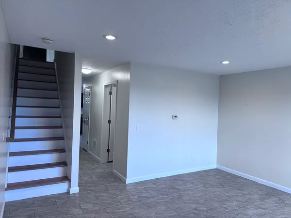 a view of entryway with stairs