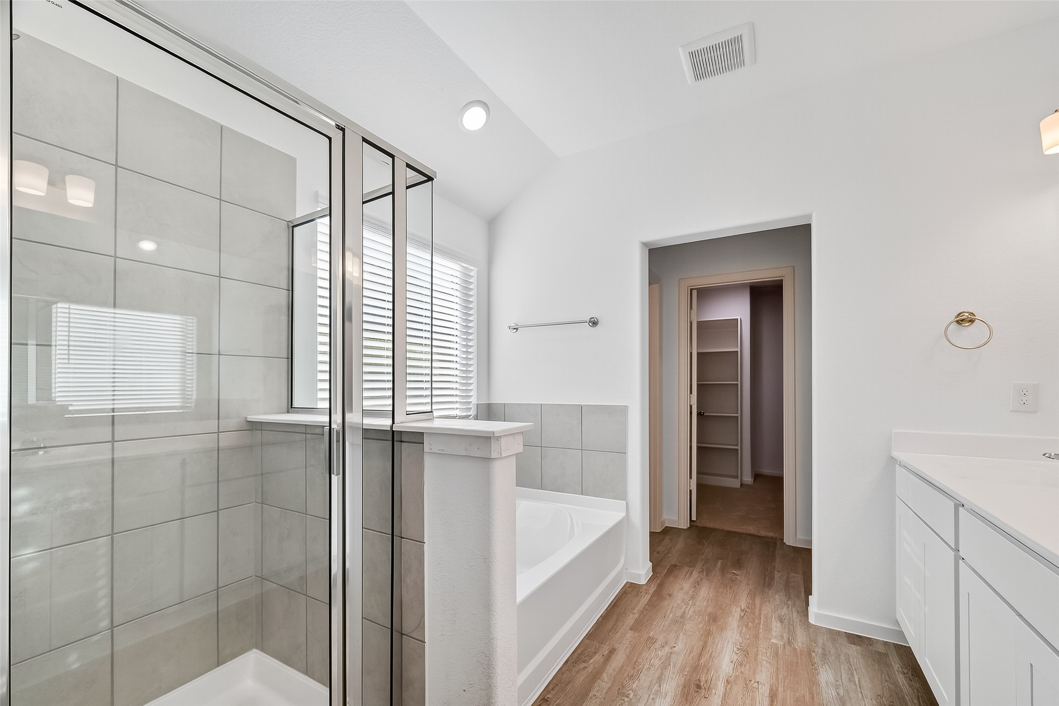 2115 Spring Hollow Drive Baytown, TX 77521 - Photo 17 of 36 a bathroom with a bathtub and a sink