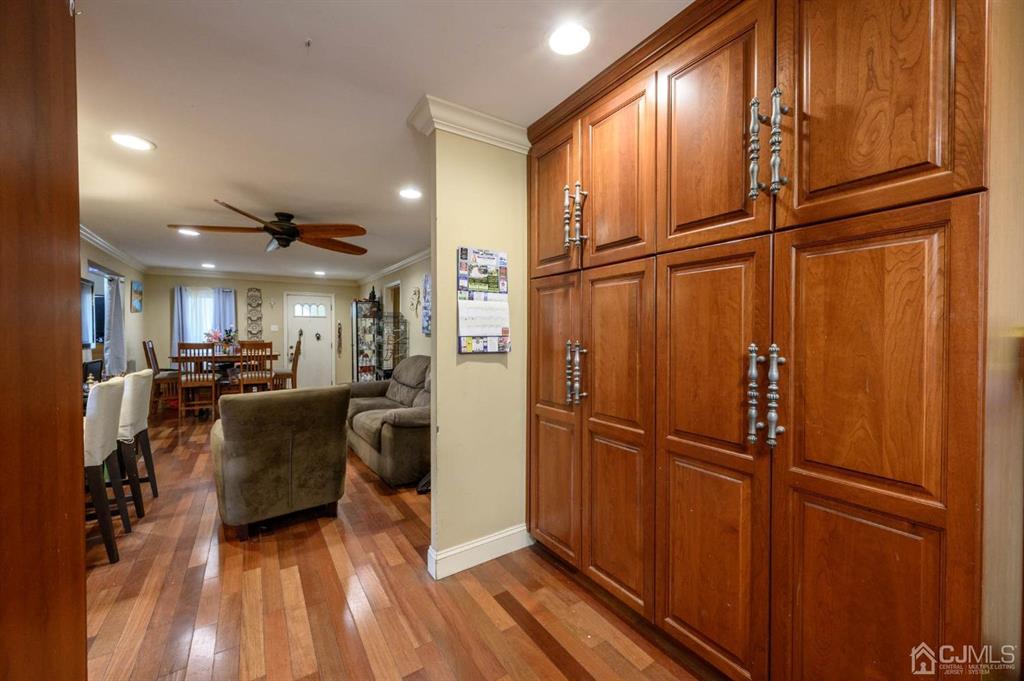 240 Lloyd Road Aberdeen, NJ 07747 - Photo 12 of 29 a view of living room with furniture and wooden floor