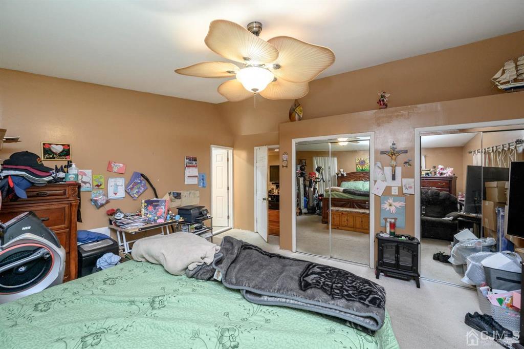 240 Lloyd Road Aberdeen, NJ 07747 - Photo 15 of 29 a view of a room with gym equipment
