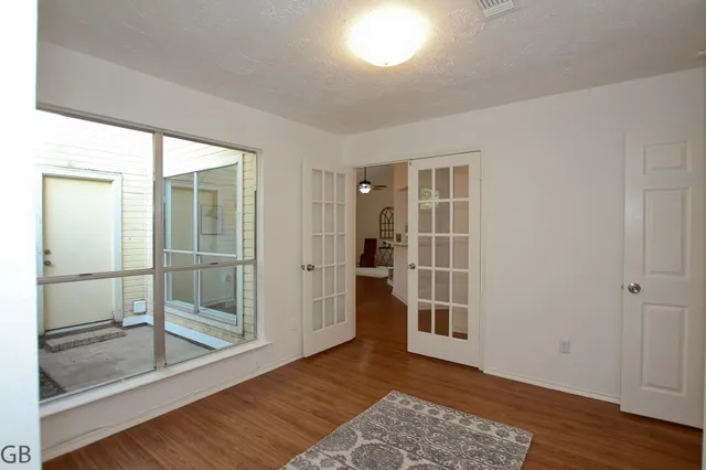 a view of livingroom with furniture wooden floor and window
