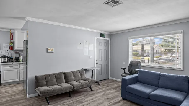 a living room with furniture and a couch