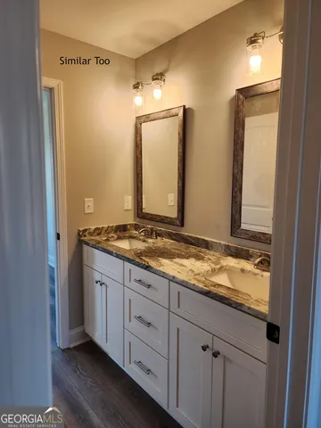 a bathroom with a toilet and a bathtub