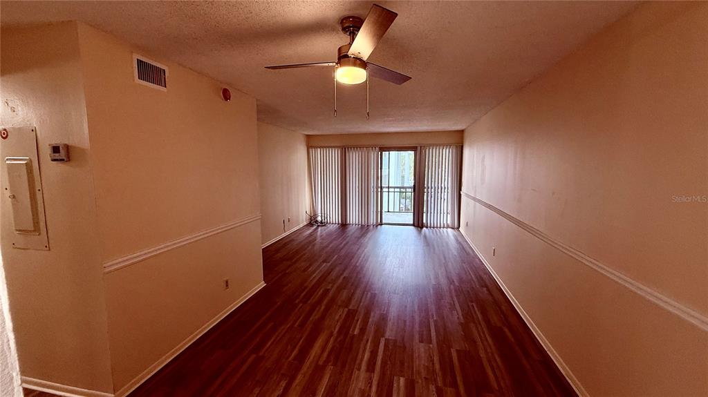 6519 West Newberry Road, Unit 206 Gainesville, FL 32605 - Photo 5 of 14 a view of entryway with wooden floor