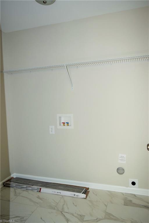 150 Tilly Road Madison, NC 27025 - Photo 11 of 38 Laundry room has tile flooring