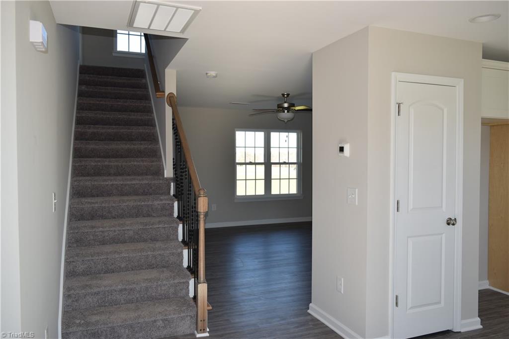150 Tilly Road Madison, NC 27025 - Photo 13 of 38 Stairs to upper level