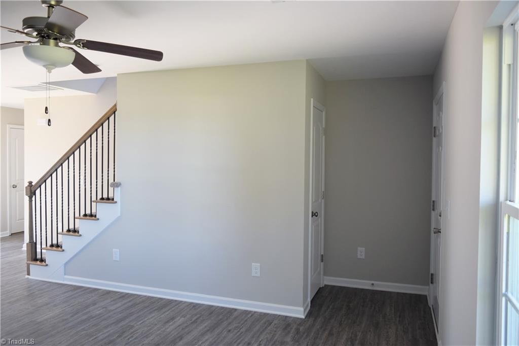 150 Tilly Road Madison, NC 27025 - Photo 4 of 38 Living room has vinyl plank flooring