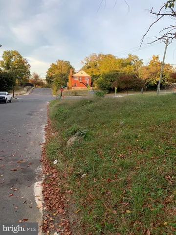 a view of a road with an ocean view