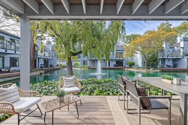 a garden view with a seating space