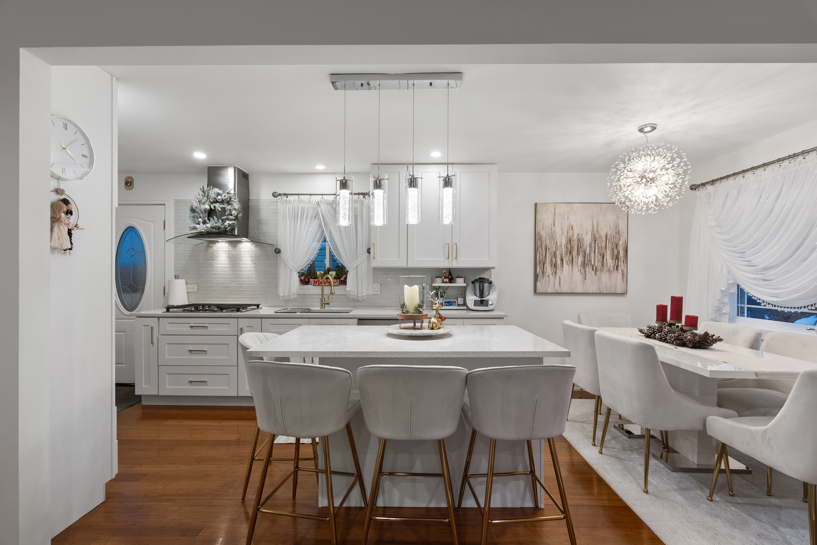 8239 Sayre Avenue Burbank, IL 60459 - Photo 3 of 30 a kitchen with a dining table chairs stove and cabinets