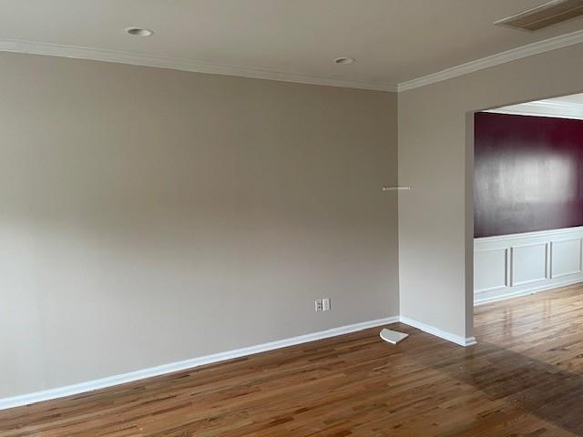 1105 Thornebrooke Court Suwanee, GA 30024 - Photo 23 of 31 a view of an empty room with wooden floor