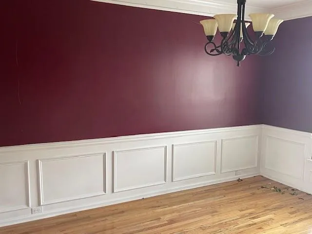 a view of a livingroom with wooden floor