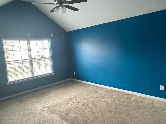 1105 Thornebrooke Court Suwanee, GA 30024 - Photo 10 of 31 an empty room with a ceiling fan and window