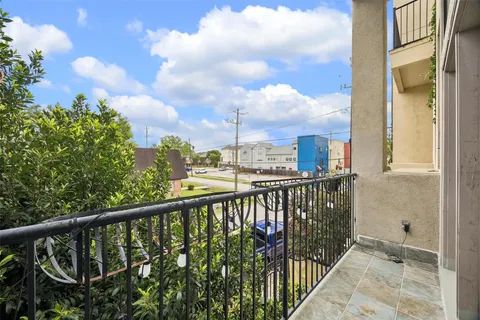 a view of a balcony with city view