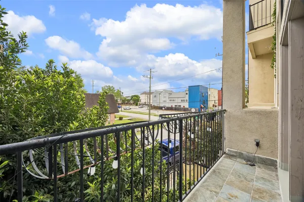 a view of a balcony with city view
